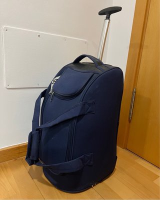 Maleta de cabina azul con ruedas