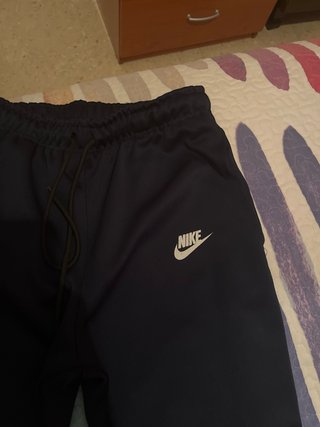 Pantalón Nike largo azul con logo