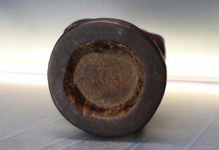 Artesanía África: Talla de madera de tres cabezas unidas.