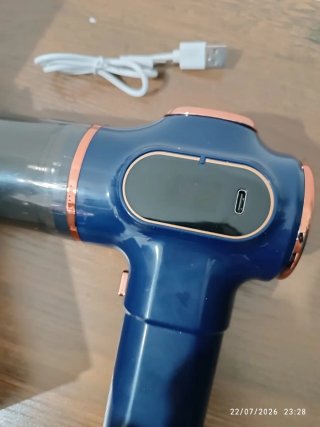Mini aspirador a batería azul, nuevo.