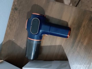 Mini aspirador a batería azul, nuevo.