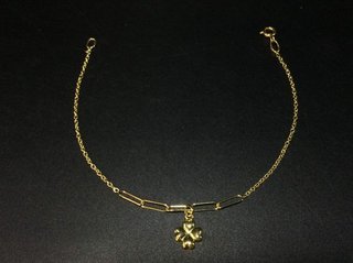 Pulsera de oro 18k con colgante trébol