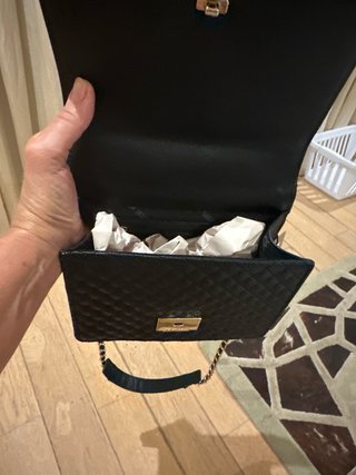 Bolso bandolera Steve Madden negro y dorado