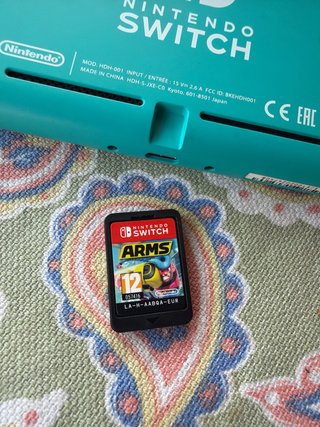 Nintendo Switch Lite Verde/Morado + Gioco ARMS