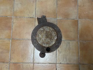 Estufa leña antigua cilíndrica
