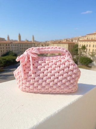 Borsa clutch rosa uncinetto