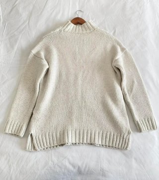 Jersey trenzado crema cuello alto Oysho oversize