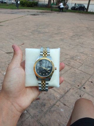 Reloj Ruisung bicolor dorado y plateado