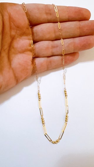 Collana con maglie e sfere in oro giallo 18kt 750