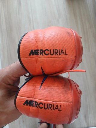 Zapatillas multitacos Nike Naranja y Azul