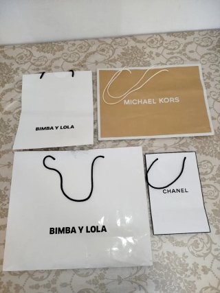 Bolsas Michael Kors, Chanel y Bimba y Lola