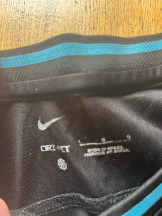 Camiseta Nike Brasil Negra y Turquesa