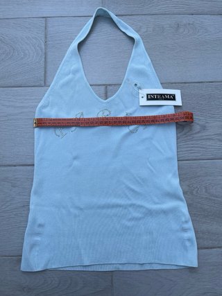 Top azzurro con scritta paris