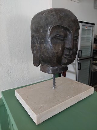 Antigua cabeza Buda basalto 1920