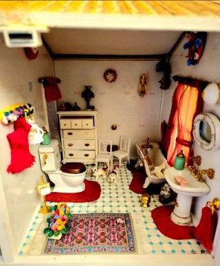 Casita de muñecas de madera