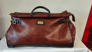 Bolso de viaje polipiel marrón