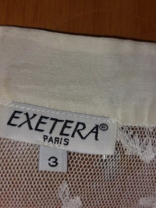Blusa de encaje blanco Exetera