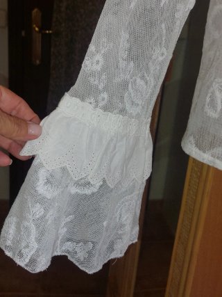 Blusa de encaje blanco Exetera
