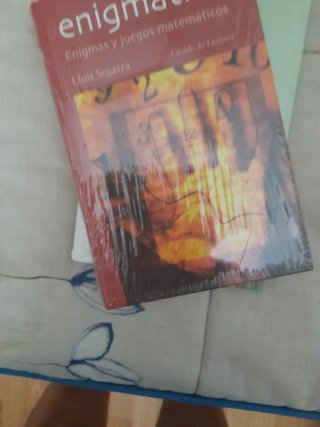 Enigmática enigmas y juegos matemáticos