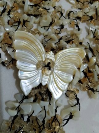 Collana farfalla topazio e madreperla
