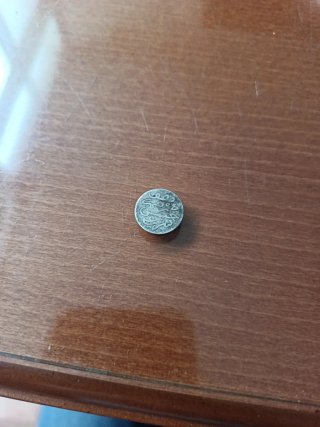 Moneda pequeña de plata