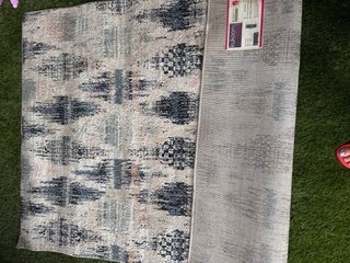 Alfombra estampada beige, azul y gris
