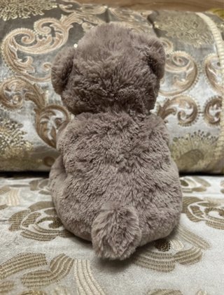 Oso de peluche con corazón rojo