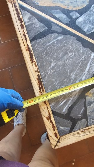 Mesa de centro artesanal de marmol y madera
