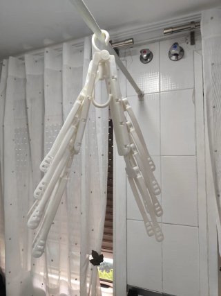 Percha plegable organizadora de ropa