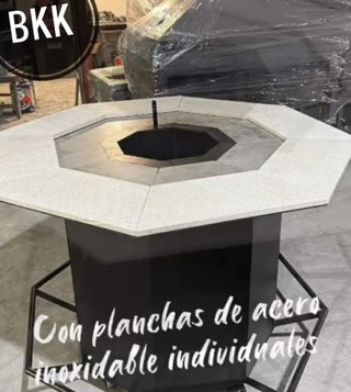 Mesa de comedor con parrilla integrada