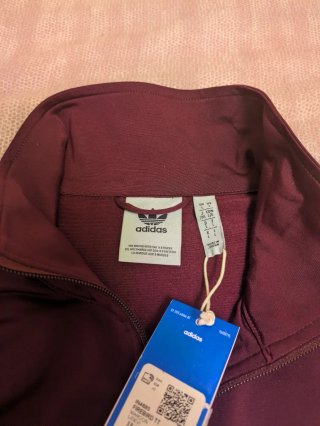 Giacca Adidas bordeaux con strisce bianche
