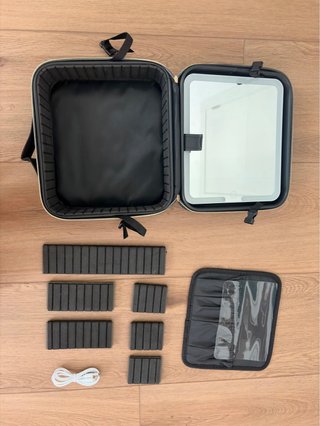 Neceser organizador rígido de viaje con espejo