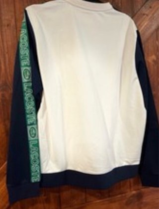 Sudadera Lacoste azul y blanca