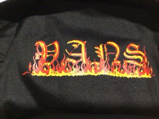 Mochila Vans Negra con Diseño de Llamas