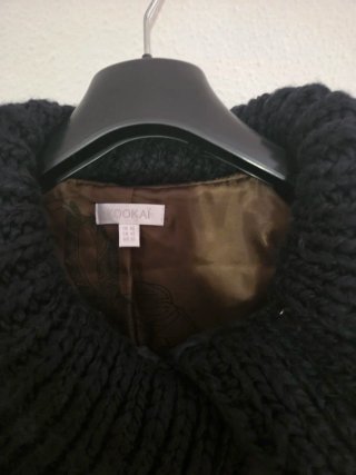 Piumino Kookaï corto nero con collo in maglia
