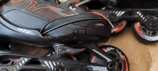 Patines Oxelo para niño Talla 32 Negros y Naranja