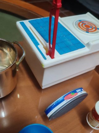 Juguetes de cocina y peluche