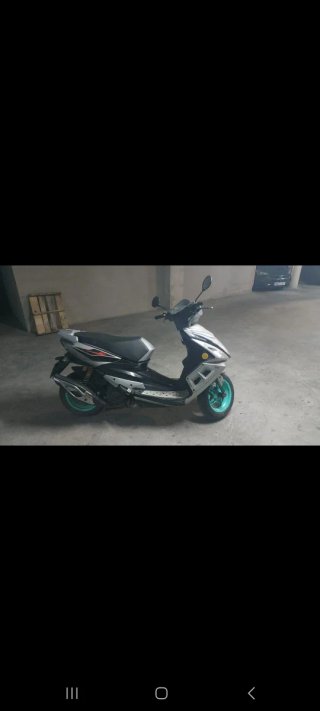 Scooter Plata y Verde