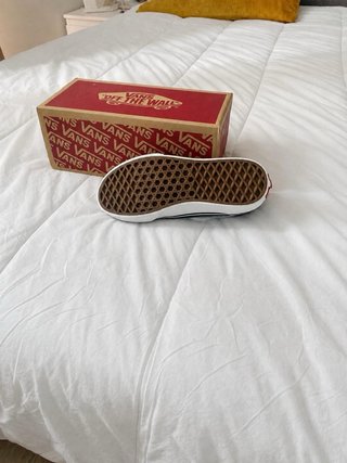 Zapatillas Vans Negras con Raya Blanca