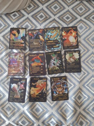 Lote de cartas Pokémon + álbum Pokémon GO + Chariz