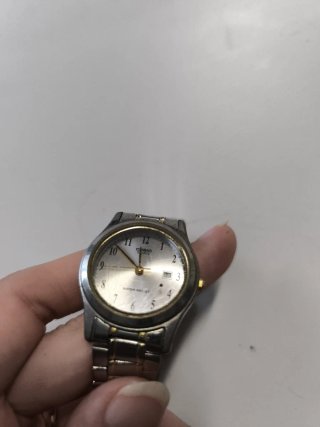 Reloj Casio Dorado y Plateado
