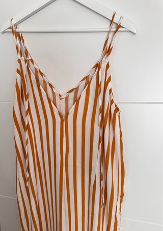 Mono rayas naranja y blanco