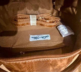 Bolso bombonera redondo piel efecto serpiente