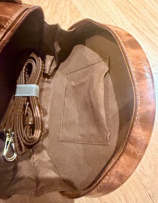 Bolso bombonera redondo piel efecto serpiente