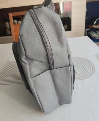 Mini mochila gris nueva con etiqueta