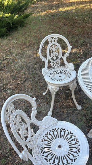 Mesa y 4 sillas de jardín