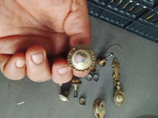 Lote tiradores muebles latón y porcelana años 50