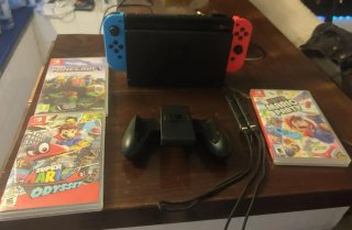 Nintendo Switch + 3 Giochi + Accessori