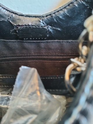 Borsa nera trapuntata con catena