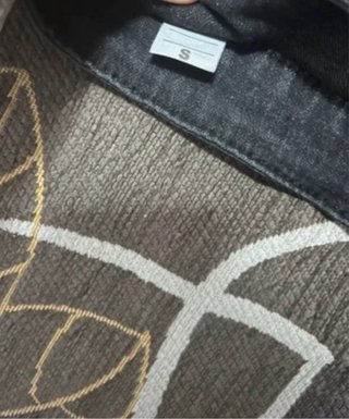 Jeans neri flared con schizzi